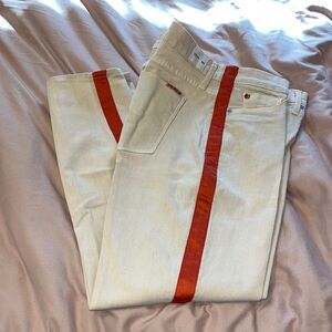 Hudson cream colored jeans with orange side stripe